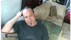 Mike Hawk squeezes his cock and balls Thumb