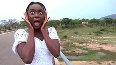 Ebony girlfriend sucking my big ivory cock at safari camper van Thumb